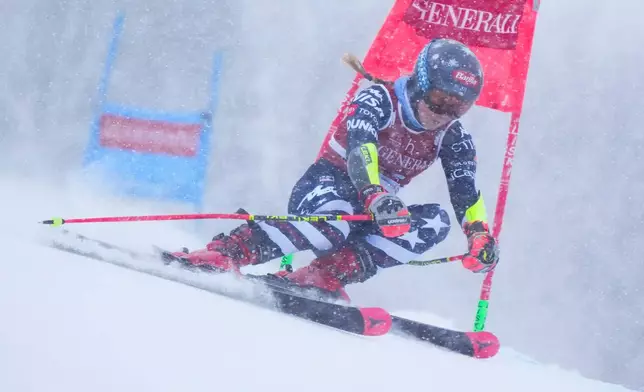 Mikaela Shiffrin of the USA speeds down the course as she races in the women's World Cup giant slalom in Mont Tremblant, Que., Saturday, Dec. 6, 2025. (Sean Kilpatrick /The Canadian Press via AP)