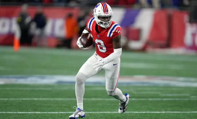 New England Patriots wide receiver Stefon Diggs runs during the first half of an NFL football game against the New York Giants, Monday, Dec. 1, 2025, in Foxborough, Mass. (AP Photo/Charles Krupa)
