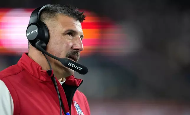 New England Patriots head coach Mike Vrabel looks on during the first half of an NFL football game against the New York Giants, Monday, Dec. 1, 2025, in Foxborough, Mass. (AP Photo/Steven Senne)