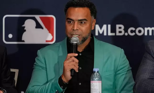 Nelson Cruz, former baseball player and general manager of the Dominican National team speaks during a news conference at the MLB winter meetings, Monday, Dec. 8, 2025, in Orlando, Fla. (AP Photo/John Raoux)