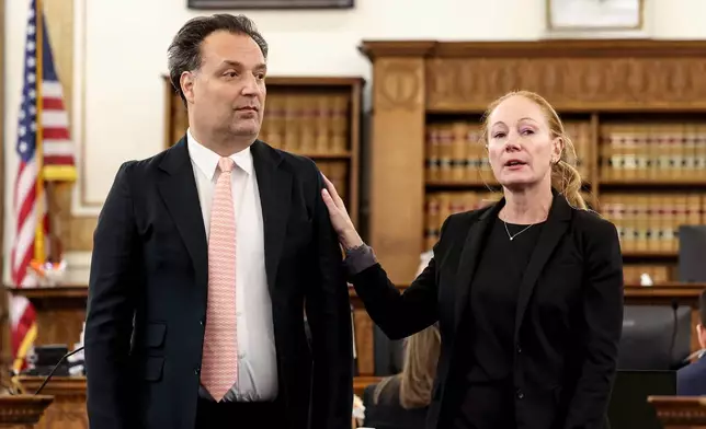 Defense attorney Kelli Porges, right, introduces her client, murder defendant Brian Walshe, to prospective jurors in Norfolk Superior Court in Dedham, Mass., Tuesday, Nov. 18, 2025. (Mark Stockwell/Boston Herald via AP, Pool)