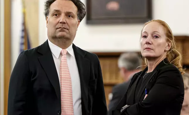 Brian Walshe appears in Norfolk Superior Court next to his attorney, Kelli Porges, after pleading guilty to two of three charges filed against him in Dedham, Mass., Tuesday, Nov. 18, 2025. (Mark Stockwell/Boston Herald via AP, Pool)
