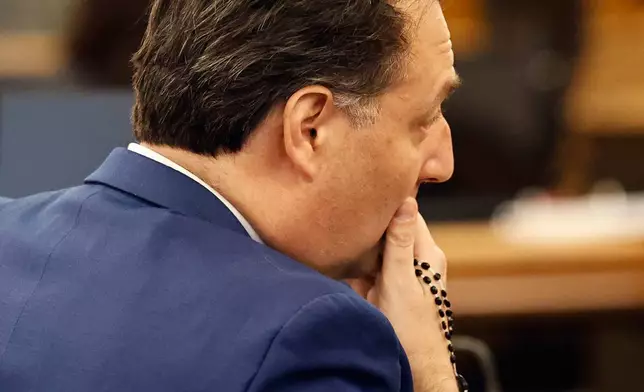 Brian Walshe listens to the case against him get outlined by prosecutor Greg Connor. Opening statements in the Brian Walshe murder trial in Norfolk Superior Court, Dedham, Mass., Monday, Dec. 1, 2025 (Greg Derr/The Patriot Ledger via AP, Pool)