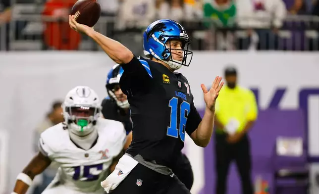Detroit Lions quarterback Jared Goff throws during the first half of an NFL football game against the Minnesota Vikings, Thursday, Dec. 25, 2025, in Minneapolis. (AP Photo/Bruce Kluckhohn)