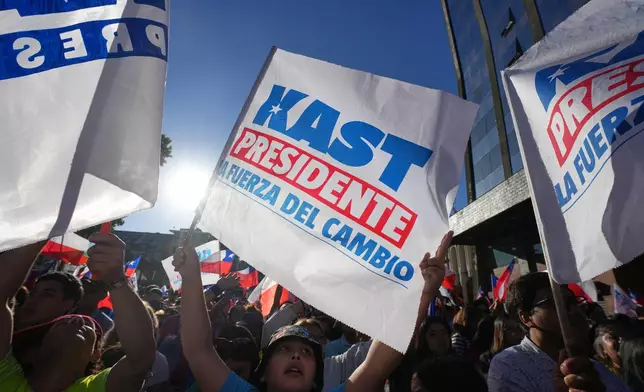 Supporters of presidential candidate Jose Antonio Kast, of the Republican Party, attend a rally ahead of the presidential runoff election in Temuco, Chile, Thursday, Dec. 11, 2025. (AP Photo/Esteban Felix)