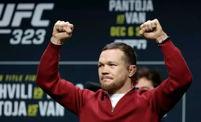 UFC bantamweight fighter Petr Yan, of Russia, poses during a news conference promoting UFC 323, Thursday, Dec. 4, 2025, in Las Vegas. (Steve Marcus/Las Vegas Sun via AP)