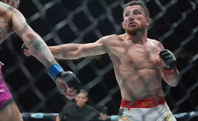 FILE - Georgia's Merab Dvalishvili during the second round of a bantamweight title bout against Sean O'Malley at the UFC 316 mixed martial arts event Sunday, June 8, 2025 in Newark, N.J. (AP Photo/Frank Franklin II, File)