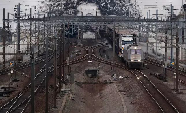 FILE - A train coming from London leaves the Northbound Channel tunnel in Calais, northern France, on Jan. 31, 2020. (AP Photo/Thibault Camus, File)