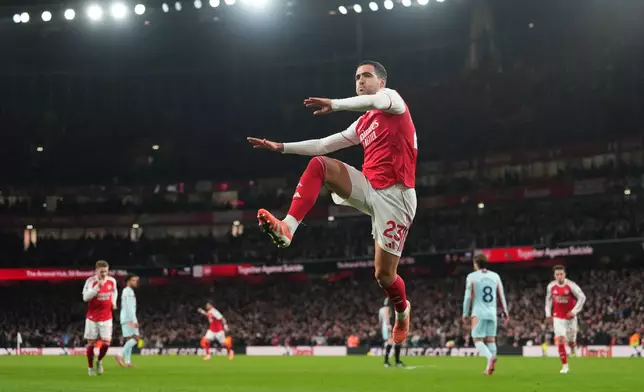 Arsenal's Mikel Merino celebrates after scoring during a Premier League soccer match between Arsenal and Brentford in London, Wednesday, Dec. 3, 2025. (AP Photo/Kirsty Wigglesworth)