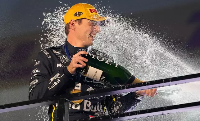 FILE - First place finisher Red Bull driver Max Verstappen of the Netherlands celebrates after the Formula One Las Vegas Grand Prix auto race, Saturday, Nov. 22, 2025 in Las Vegas. (AP Photo/John Locher, File)