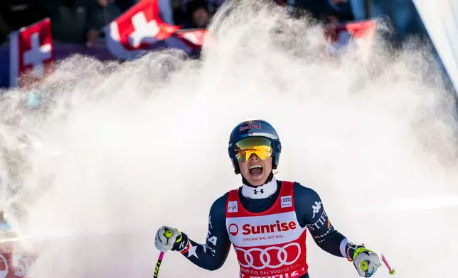 Lindsey Vonn of the United States reacts after completing an alpine ski, women’s World Cup downhill, in St. Moritz, Switzerland, Saturday Dec. 13, 2025 (Jean-Christophe Bott/Keystone via AP)