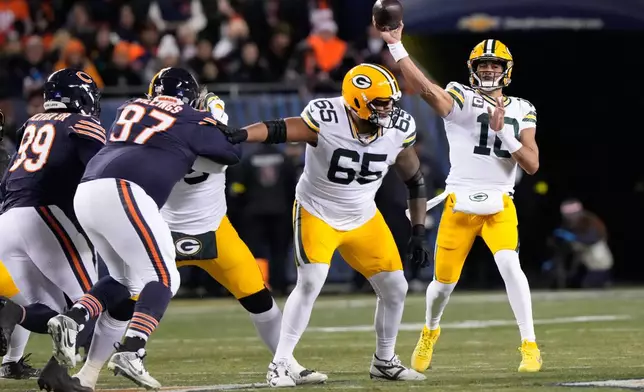 Green Bay Packers' Jordan Love throws during the first half of an NFL football game against the Chicago Bears Saturday, Dec. 20, 2025, in Chicago. (AP Photo/Nam Huh)