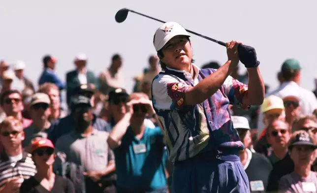 FILE - Japan's Jumbo Ozaki watches his tee shot on the third hole during his opening round of the Masters at the Augusta National Golf Club in Augusta, Ga., April 10, 1997. (AP Photo/Bill Waugh, File)