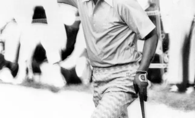 FILE - Masashi "Jumbo" Ozaki of Japan waves to the gallery Thursday during the first round of the Masters at Augusta, Ga., April 6, 1973. (AP Photo, File)