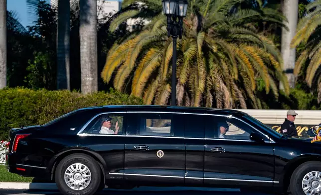 President Donald Trump waves as he departs Trump International Golf Club, Saturday, Dec. 27, 2025, in West Palm Beach, Fla. (AP Photo/Alex Brandon)