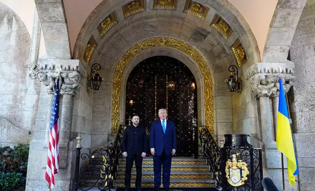 President Donald Trump greets Ukraine's President Volodymyr Zelenskyy at his Mar-a-Lago club, Sunday, Dec. 28, 2025, in Palm Beach, Fla. (AP Photo/Alex Brandon)