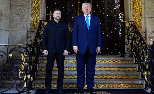 President Donald Trump greets Ukraine's President Volodymyr Zelenskyy at his Mar-a-Lago club, Sunday, Dec. 28, 2025, in Palm Beach, Fla. (AP Photo/Alex Brandon)