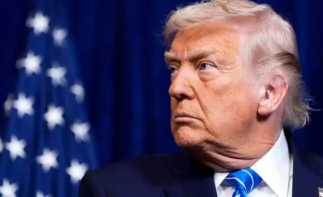 President Donald Trump attends a joint news conference with Ukraine's President Volodymyr Zelenskyy following a meeting at Trump's Mar-a-Lago club, Sunday, Dec. 28, 2025, in Palm Beach, Fla. (AP Photo/Alex Brandon)