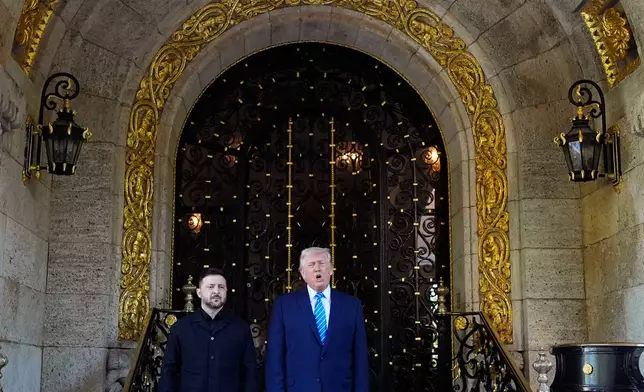 President Donald Trump greets Ukraine's President Volodymyr Zelenskyy at his Mar-a-Lago club, Sunday, Dec. 28, 2025, in Palm Beach, Fla. (AP Photo/Alex Brandon)