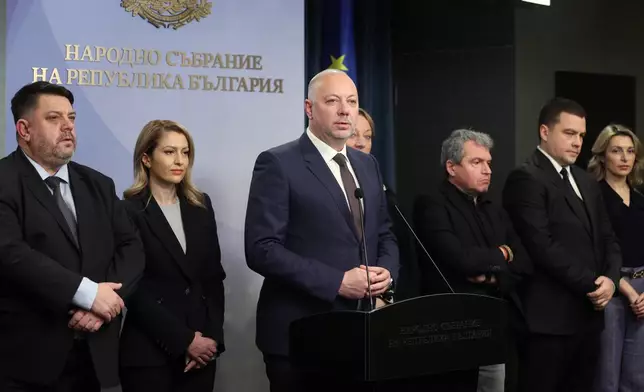 Bulgarian Prime Minister Rosen Zhelyazkov announces that Bulgaria's government resigns following mass protests, at the Bulgarian Parliament in Sofia, Bulgaria, Thursday, Dec. 11, 2025. (Bulgarian News Agency via AP)