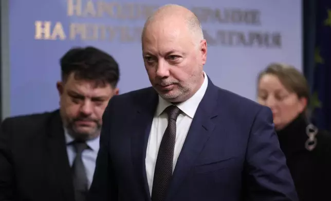 Bulgarian Prime Minister Rosen Zhelyazkov announces that Bulgaria's government resigns following mass protests, at the Bulgarian Parliament in Sofia, Bulgaria, Thursday, Dec. 11, 2025. (Bulgarian News Agency via AP)