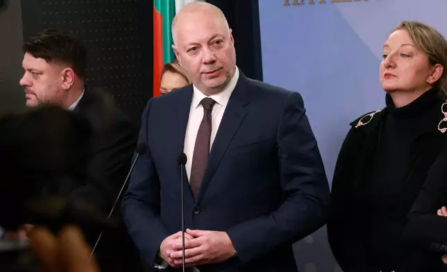 Bulgarian Prime Minister Rosen Zhelyazkov announces that Bulgaria's government resigns following mass protests, at the Bulgarian Parliament in Sofia, Bulgaria, Thursday, Dec. 11, 2025. (Bulgarian News Agency via AP)