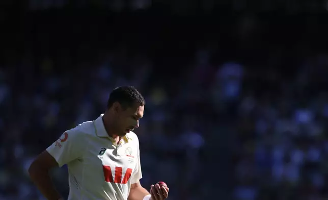 Australia's Scott Boland prepares to bowl to England during their Ashes cricket test match in Melbourne, Friday, Dec. 26, 2025. (AP Photo/Hamish Blair)
