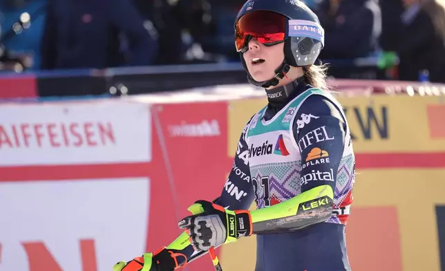 United States' Mikaela Shiffrin reacts in the finish area of an alpine ski, women's World Cup super-G event, in St. Moritz, Switzerland, Sunday Dec. 14, 2025. (AP Photo/Luciano Bisi)