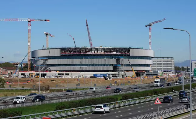 An outside view of the Santa Giulia Ice Hockey Arena, in Milan, where Ice Hockey discipline of the Milan Cortina 2026 Winter Olympics will take place Italy, Friday, Oct. 24, 2025. (AP Photo/Luca Bruno, File)