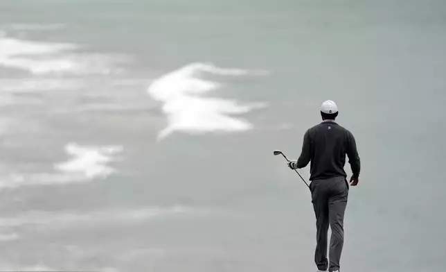 FILE - Tiger Woods walks to the ninth green during the third round of the U.S. Open Championship golf tournament, June 15, 2019, in Pebble Beach, Calif. (AP Photo/Carolyn Kaster, File)