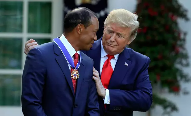 FILE - President Donald Trump presents the Presidential Medal of Freedom to Tiger Woods during a ceremony in the Rose Garden of the White House in Washington, Monday, May 6, 2019. (AP Photo/Manuel Balce Ceneta, File)