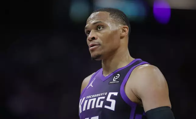 Sacramento Kings guard Russell Westbrook looks on during the first half of an NBA basketball game against the Dallas Mavericks, Saturday, Dec. 27, 2025, in Sacramento, Calif. (AP Photo/Scott Marshall)