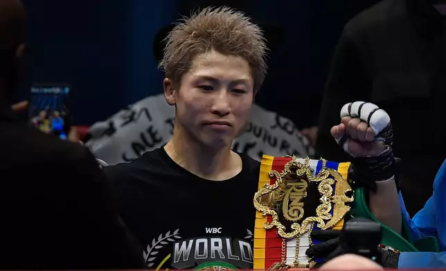 Japan's Naoya Inoue celebrates after beating Alan Picasso of Mexico during a boxing match for the unified WBC IBF WBO WBA super bantamweight world title in Riyadh, Saudi Arabia, Saturday, Dec. 27, 2025. (AP Photo)
