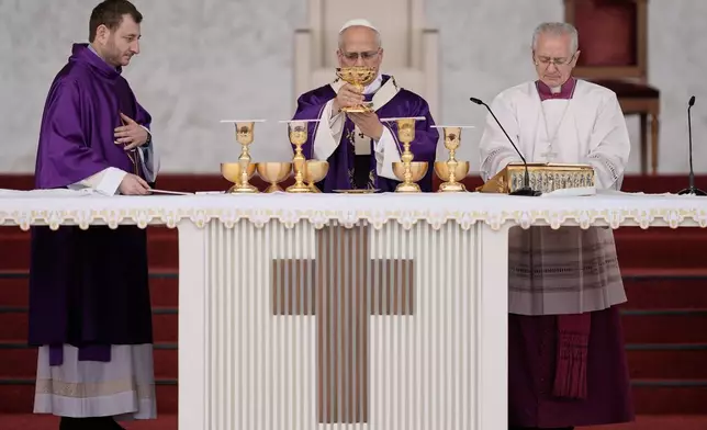 Pope Leo XIV celebrates a Holy Mass at Beirut waterfront, in Beirut, Lebanon, Tuesday, Dec. 2, 2025. (AP Photo/Bilal Hussein)