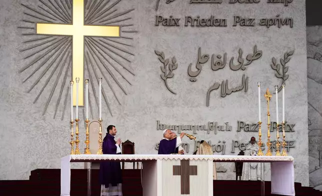Pope Leo XIV celebrates a Holy Mass at Beirut¥s waterfront in Beirut, Lebanon Tuesday, Dec. 2, 2025. (AP Photo/Domenico Stinellis)