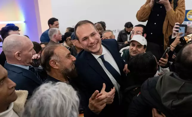 Jersey City Mayor-elect James Solomon speaks to his supporters after winning the mayoral election during a watch party, Tuesday, Dec. 2, 2025, in Jersey City, N.J. (AP Photo/Yuki Iwamura)