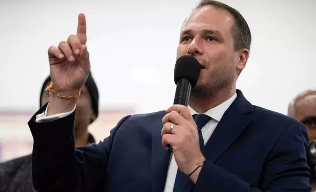 Jersey City Mayor-elect James Solomon speaks during a watch party after winning the mayoral election, Tuesday, Dec. 2, 2025, in Jersey City, N.J. (AP Photo/Yuki Iwamura)