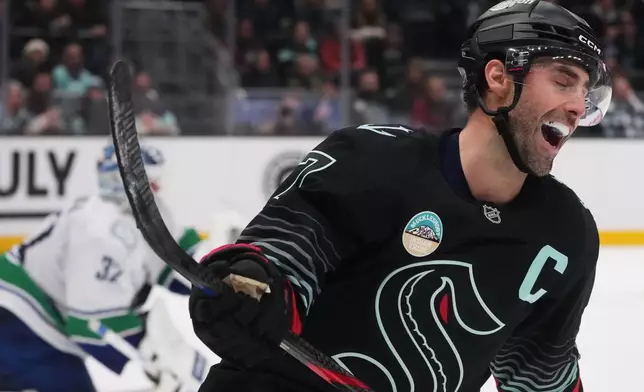 Seattle Kraken right wing Jordan Eberle reacts after his shot was blocked by Vancouver Canucks goaltender Kevin Lankinen during a shootout in an NHL hockey game Monday, Dec. 29, 2025, in Seattle. (AP Photo/Lindsey Wasson)