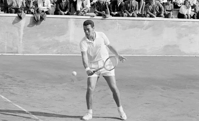 FILE - Italy's Nicola Pietrangeli in action during his Davis Cup singles tennis match against United States' Jon Douglas, in Rome, Oct. 16, 1961. (AP Photo/Mario Torrisi, File)