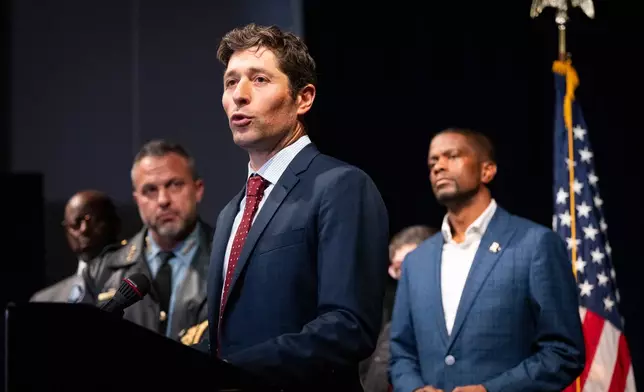 Minneapolis Mayor Jacob Frey speaks during a news conference addressing the media following reports that the Trump administration will be targeting Somali immigrants in the Twin Cities, at City Hall in Minneapolis, Tuesday, Dec. 2, 2025. (Leila Navidi/Star Tribune via AP)