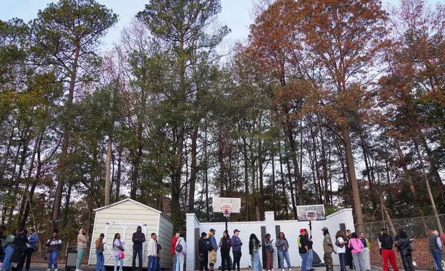 People wait in line before the 8:30 am church service at 2819 Church on Nov. 16, 2025, in Atlanta. (AP Photo/Jessie Wardarski)