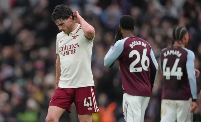 Arsenal's Declan Rice reacts after the English Premier League soccer match between Aston Villa and Arsenal in Birmingham, England, Saturday, Dec. 6, 2025. (AP Photo/Dave Shopland)