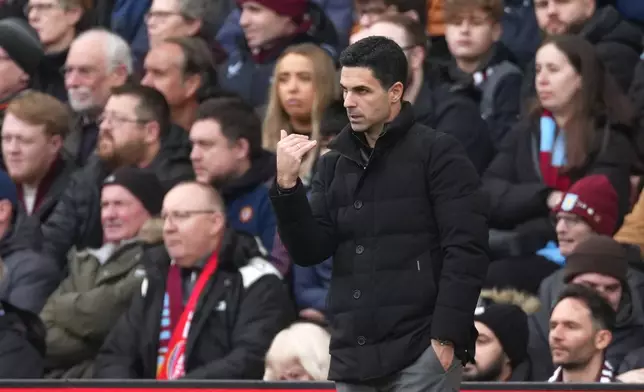 Arsenal's manager Mikel Arteta follows the game during the English Premier League soccer match between Aston Villa and Arsenal in Birmingham, England, Saturday, Dec. 6, 2025. (AP Photo/Dave Shopland)