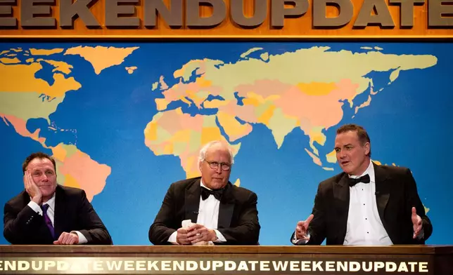 FILEW - Colin Quinn, from left, Chevy Chase and Norm Macdonald appear onstage at The 2012 Comedy Awards in New York, Saturday, April 28, 2012. (AP Photo/Charles Sykes, File)