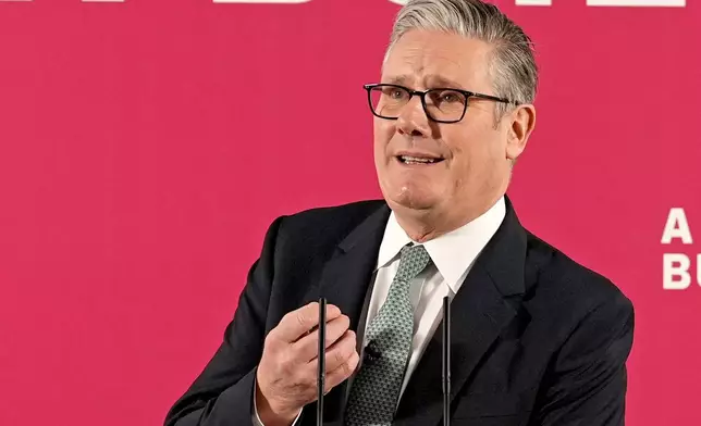 Britain's Prime Minister Keir Starmer delivers a speech, backing the Budget to signal a fresh push on welfare reform, in central London, Monday, Dec. 1, 2025. (Gareth Fuller/Pool Photo via AP)