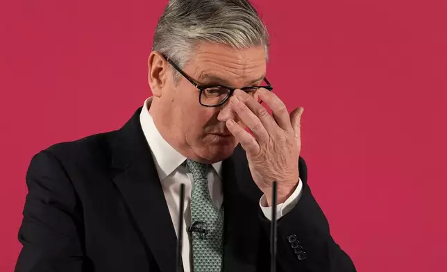 Britain's Prime Minister Keir Starmer delivers a speech in central London, Monday, Dec. 1, 2025. (Gareth Fuller/Pool Photo via AP)