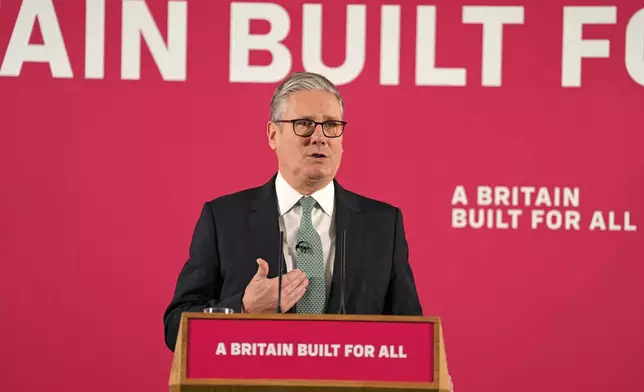 Britain's Prime Minister Keir Starmer delivers a speech, backing the Budget to signal a fresh push on welfare reform, in central London, Monday, Dec. 1, 2025. (Gareth Fuller/Pool Photo via AP)