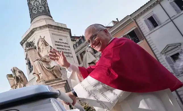 Pope Leo XIV leaves after praying in front of the statue of the Virgin Mary next to the Spanish Steps in Rome, Monday, Dec. 8, 2025, on the Catholic Feast of the Immaculate Conception. (AP Photo/Andrew Medichini)