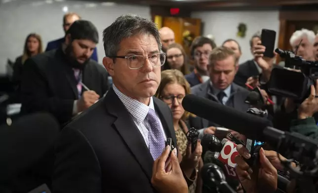 Indiana Senate President Pro Tem Rodric Bray takes a question after a bill to redistrict the state's congressional map was defeated, Thursday, Dec. 11, 2025, at the Statehouse in Indianapolis. (AP Photo/Michael Conroy)