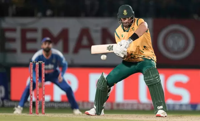 South Africa's captain Aiden Markram plays a shot during the third T20 cricket match between India and South Africa in Dharamshala, India, Sunday, Dec. 14, 2025. (AP Photo/Ashwini Bhatia)